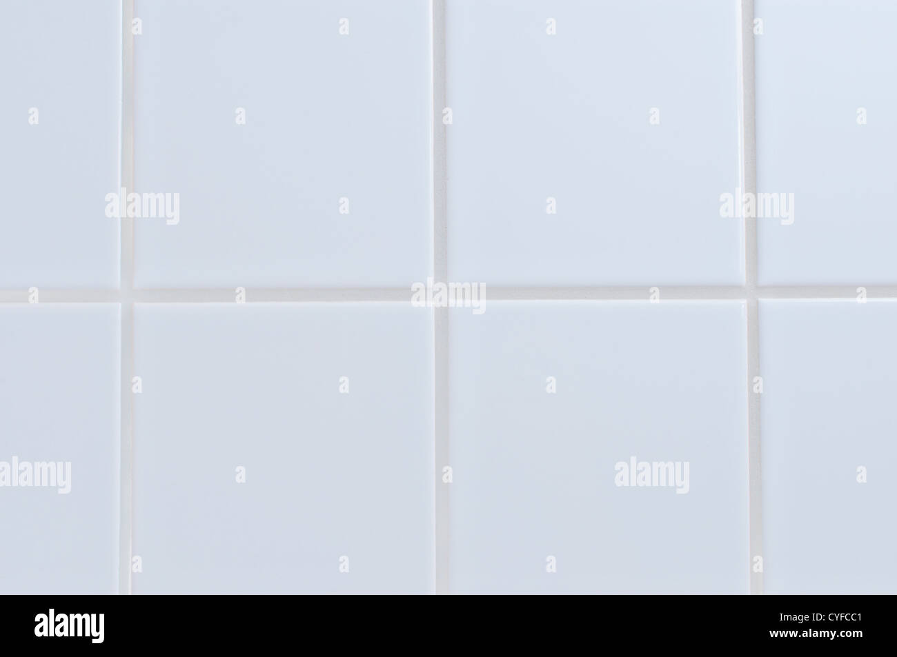 Weißes Porzellan-Ziegel-Mauer hautnah Hintergrund Stockfoto
