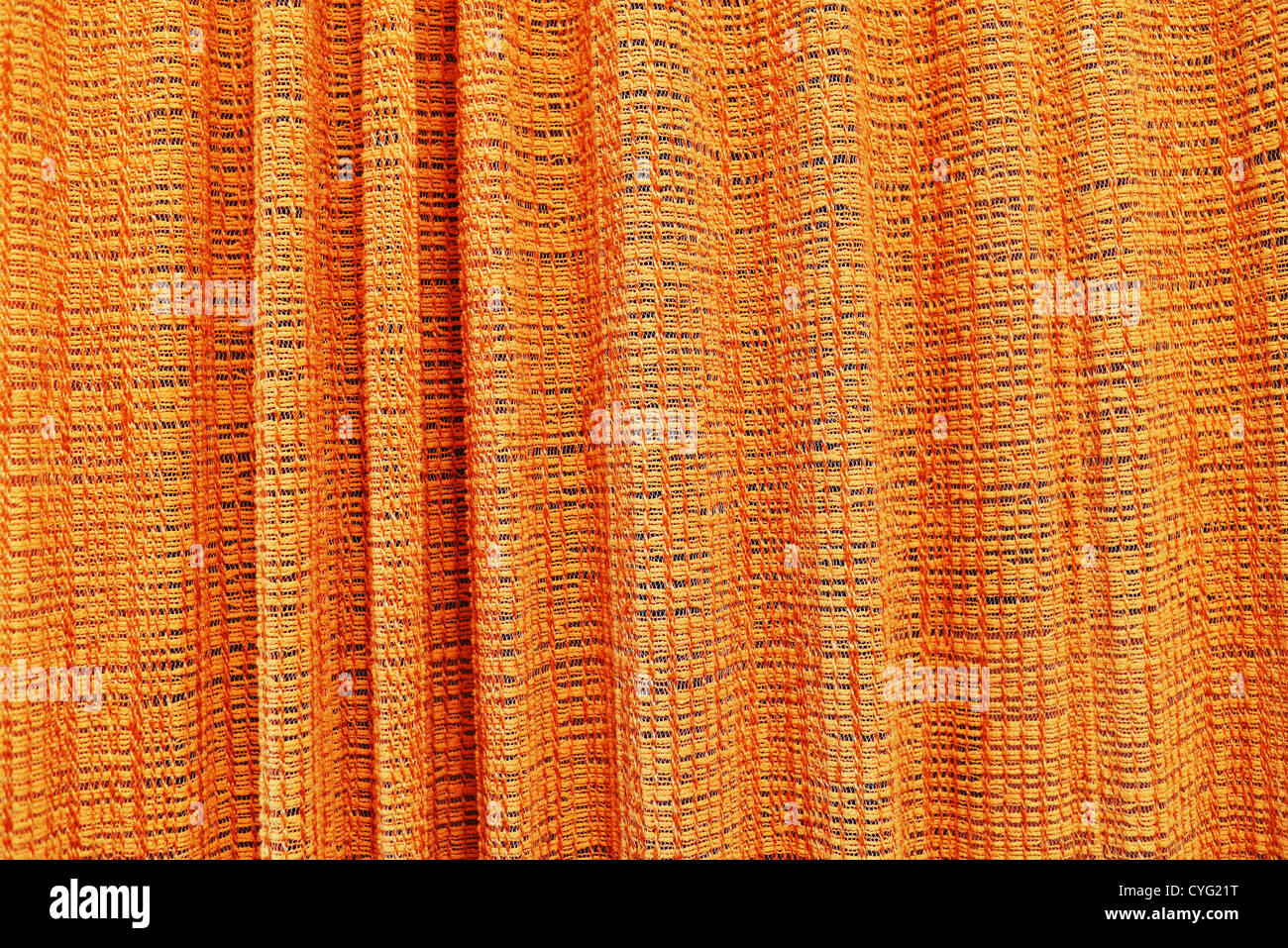 Orange Vorhang oder drapieren Textur, hoher Auflösung und sehr detailliert. Stockfoto