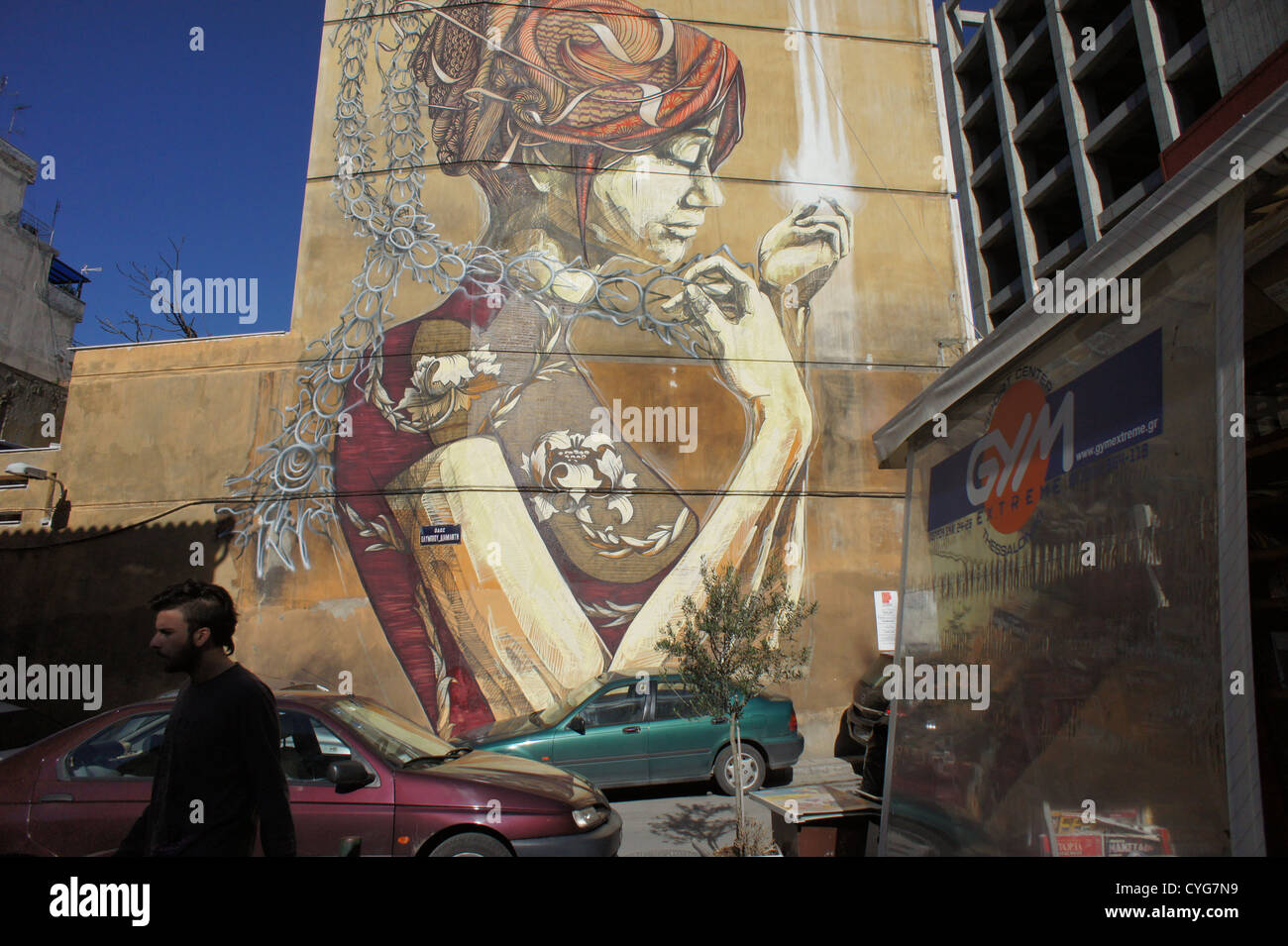 FaceArt-Public Wandgemälde von Straßenkünstlern DAL und Faith47, Thessaloniki, Griechenland. Stockfoto