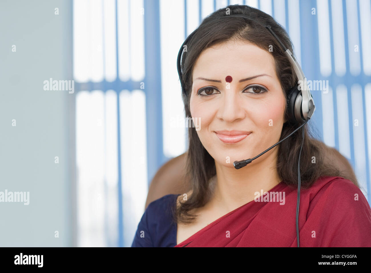Porträt von einem weiblichen Mitarbeiter des Kundendienstes Stockfoto