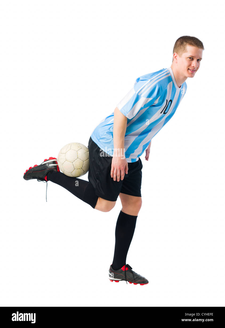 Fußball-Spieler kontrollieren einen Ball, weißen Hintergrund. Stockfoto