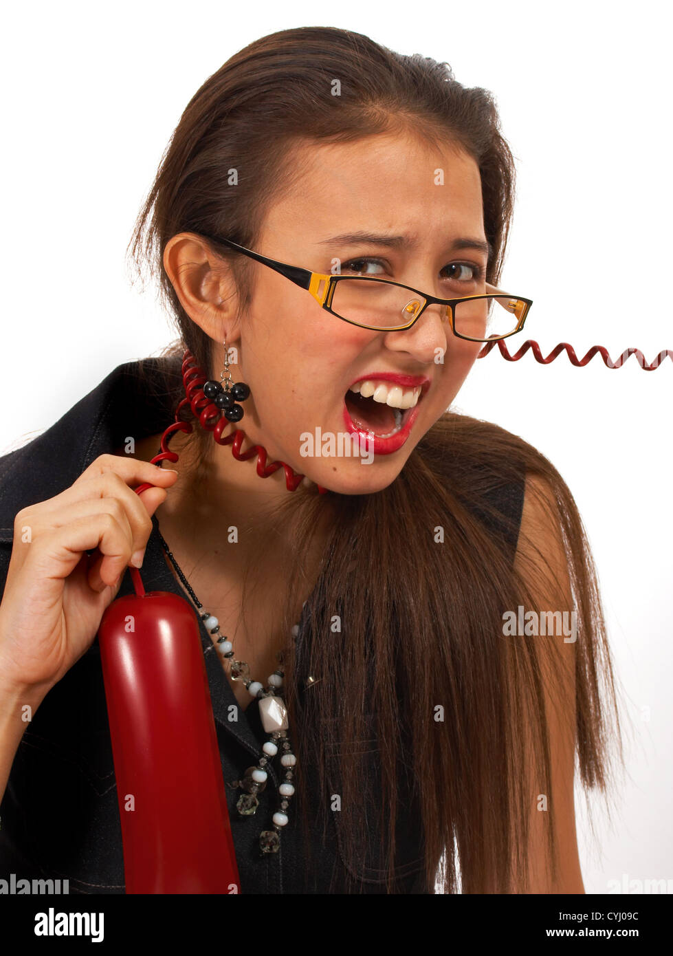 Sekretär-verrückt über lästige Telefonanruf Stockfoto
