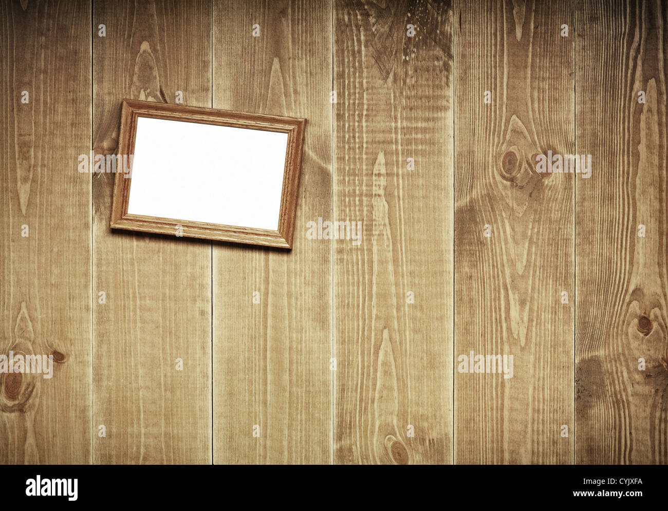 Im Alter von Holzwand mit hängenden Bild. Stockfoto