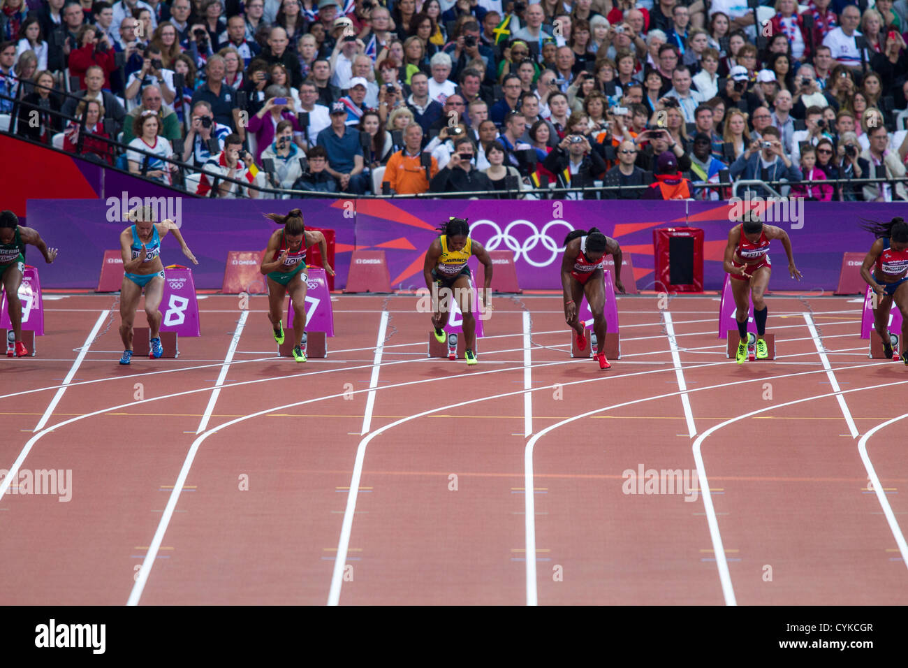 Start der Frauen 100-Meter-Halbfinale bei den Olympischen Sommerspielen 2012 in London Stockfoto