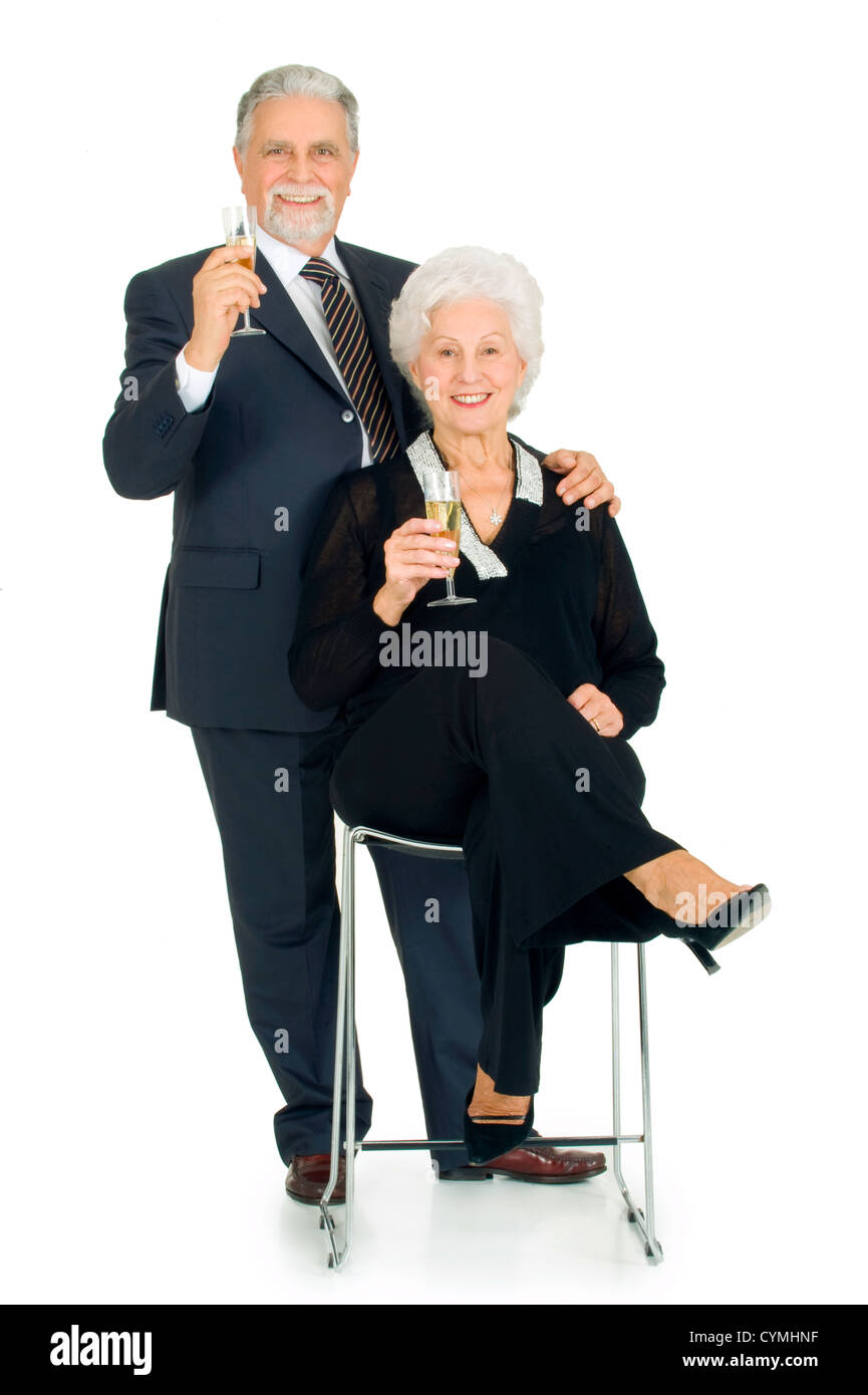 elegante älteres Ehepaar Toasten Stockfoto