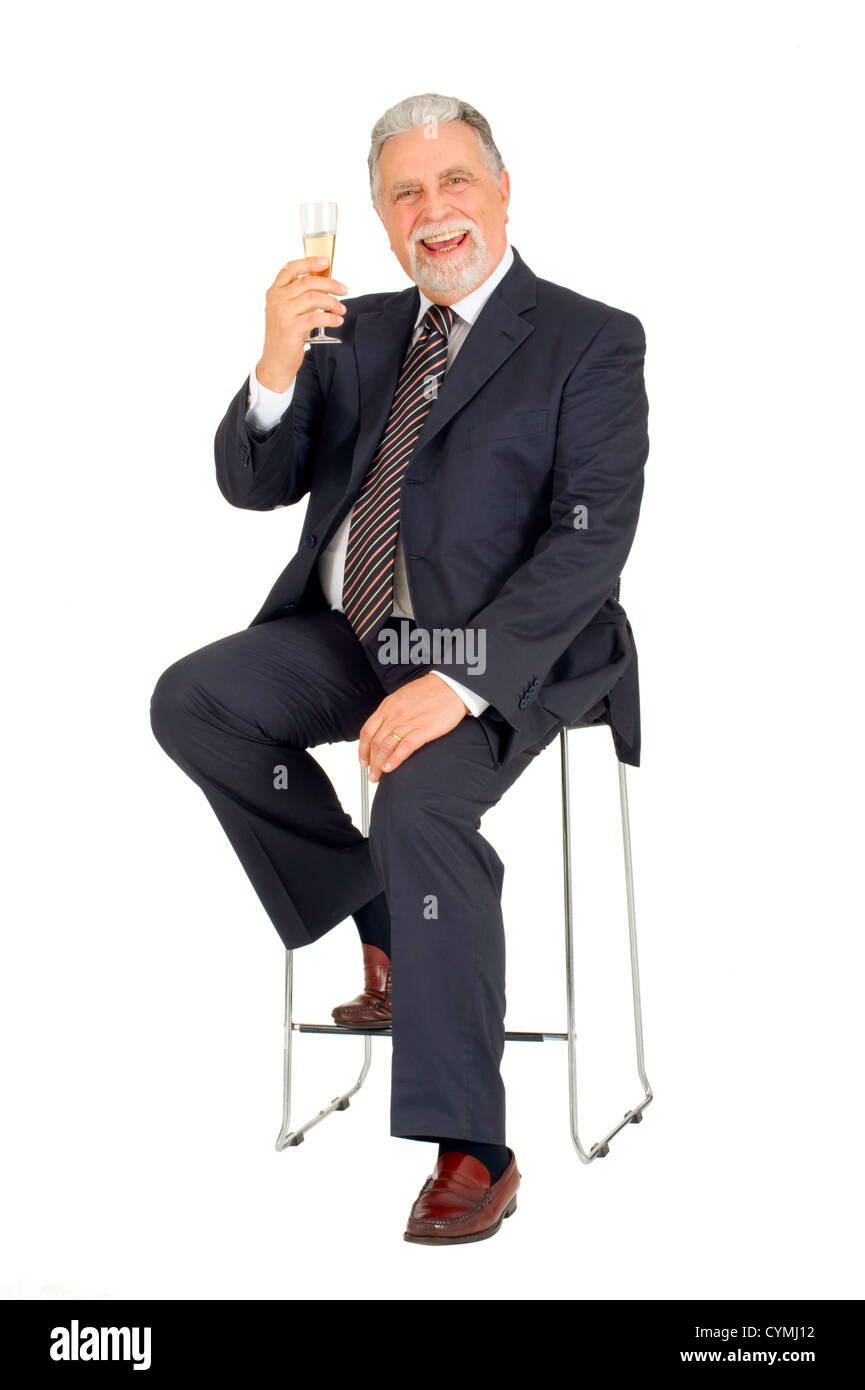 Alter Mann mit Glas Champagner Stockfoto