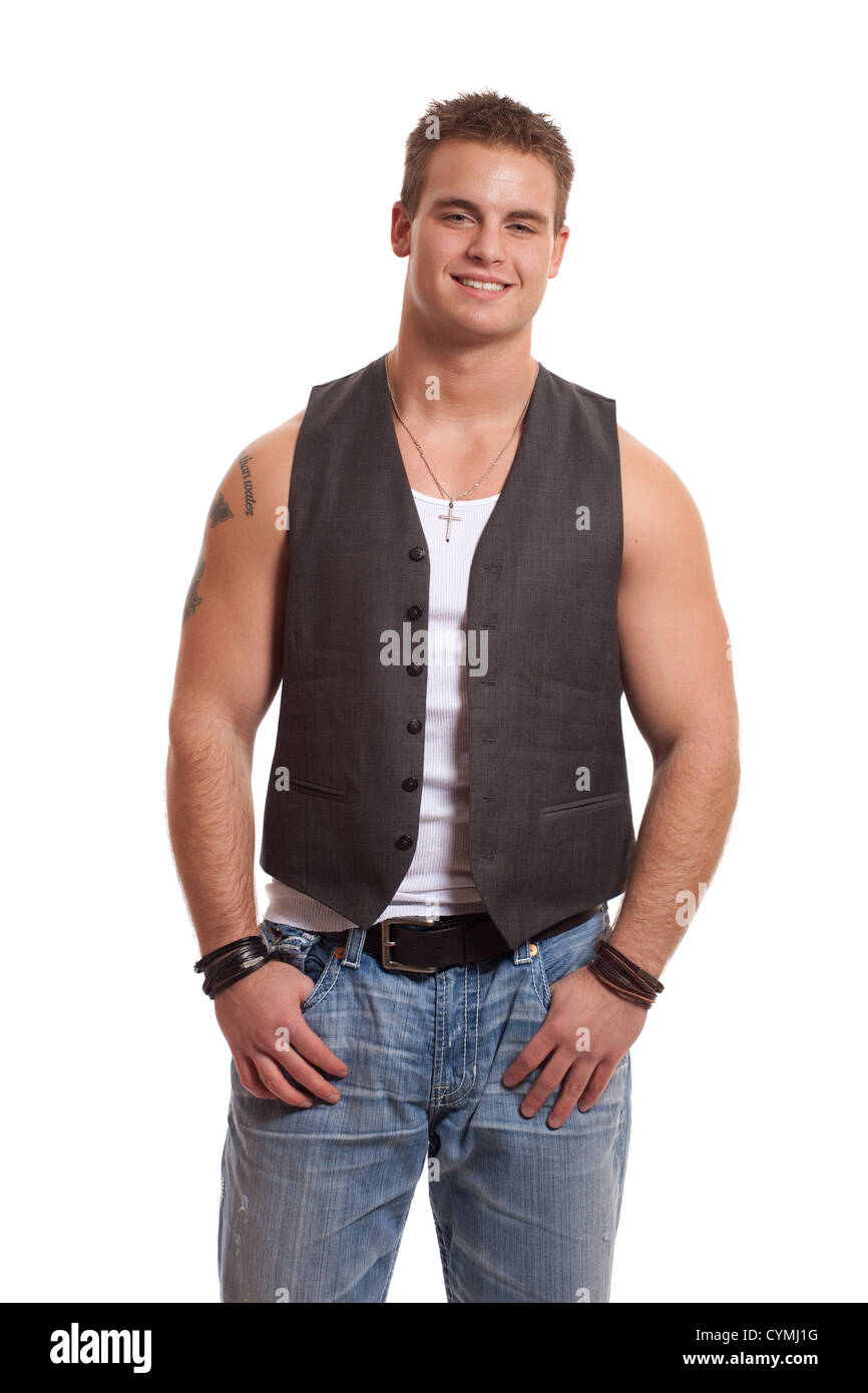 Lässige jungen Mann in Weste und Jeans. Stockfoto