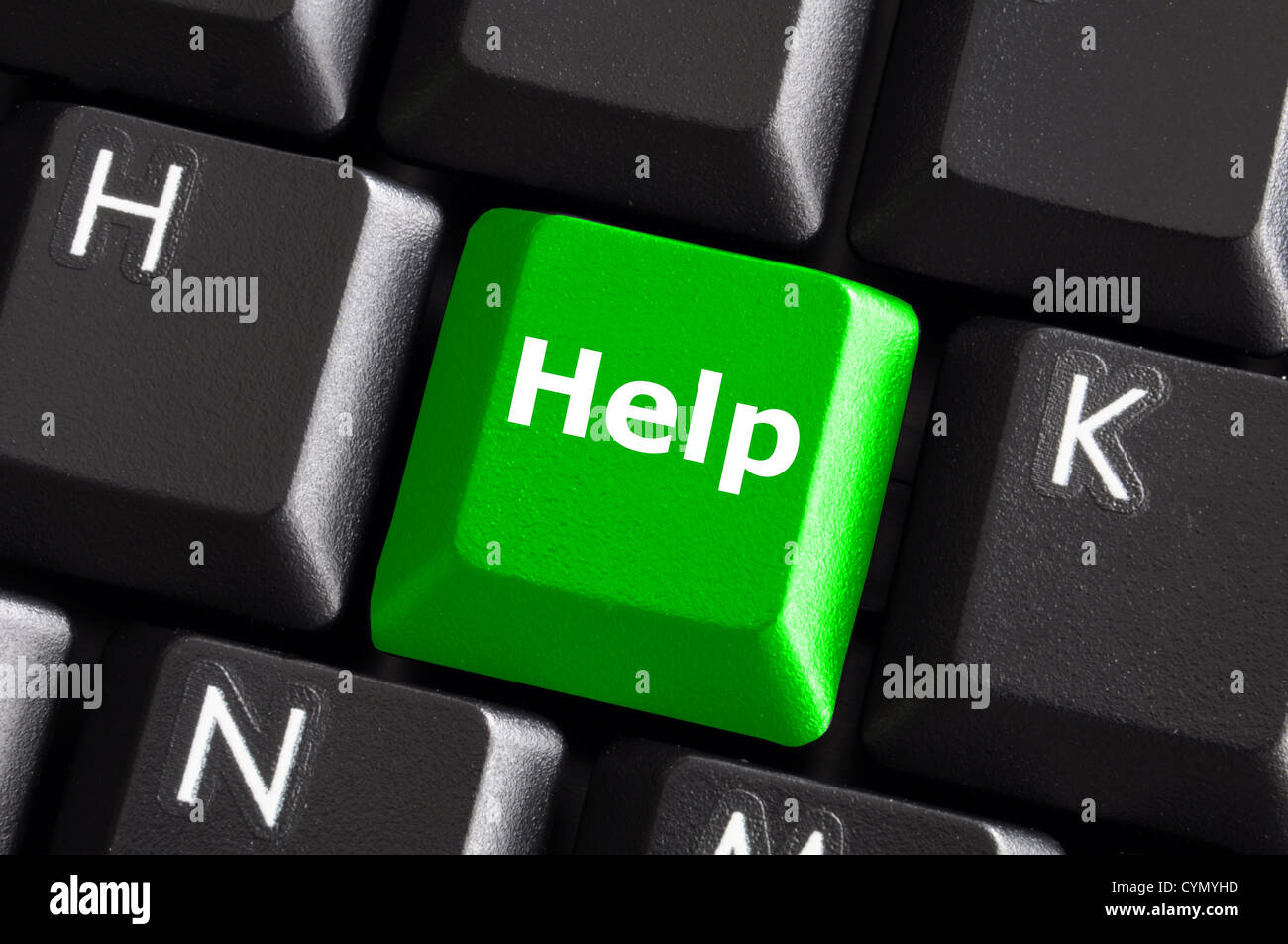 Hilfe Support oder Hilfe Konzept mit grüne Taste auf der Computertastatur Stockfoto