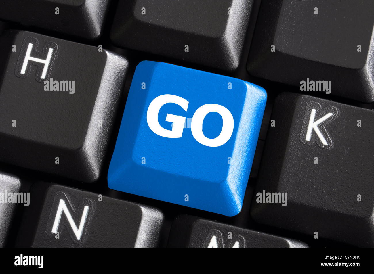 Wort auf einen blauen Computer-Tastatur-Taste oder eine Schaltfläche schriftliche gehen Stockfoto