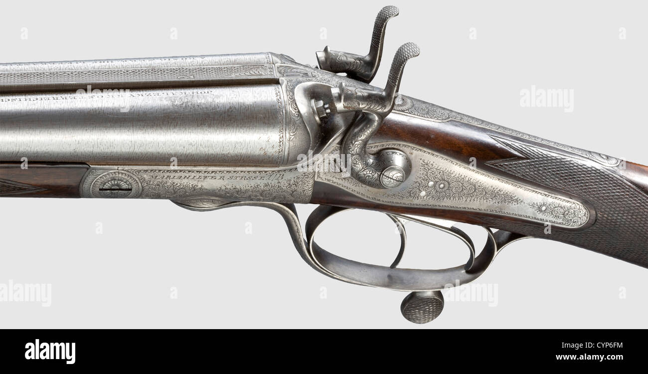 Ein Zielgewehr - 'Feuerstutzen',G. Fuchs von Marktbreit um 1900,kal. 8.15 x 46 R, Nr. 278(Unterseite der Zylinderwurzel). Achteckiger Lauf, helle Bohrung mit scharfem Profil, wenige leichte Nutzungsmarken, einwandfrei überarbeitet, auf gewellter Rippe mit der Bezeichnung 'G. FUCHS, MARKTBREIT', Länge 78 cm. Action-Fall mit reichen Reben Dekor und tief geschnittenen Bild von Schützen, kaum wahrnehmbare Kratzer in der Nähe der Unterseite auf der linken Seite. Büchel Brillant-System, mit Prüfzeichen: Krone 'U', auf der Oberseite des Gehäuses mit 'D. R. G. M. BRILLANT', Doppelauslöser. Schön geschnitzter Tiroler Schaft aus hochwertigem w,Additional-Rights-Clearences-nicht lieferbar Stockfoto