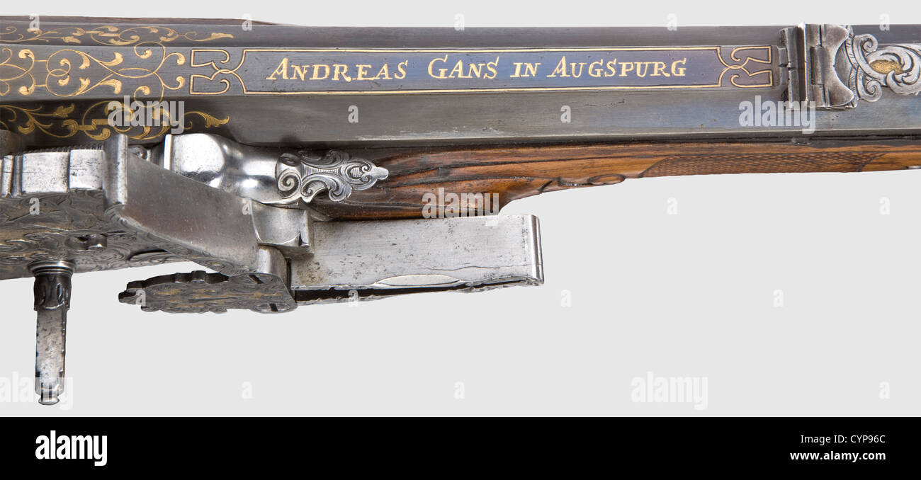 Ein prächtiges Radschlossgewehr, Gans in Augsburg, um 1720.achteckig, in  der Mitte leicht eingeengte Lauf mit siebennut gerifteter Bohrung im  Kaliber 15 mm.verschränkte Visiere mit klappbarer Rückwand.üppige,  goldeingelegte Zierrandrillen an der ...