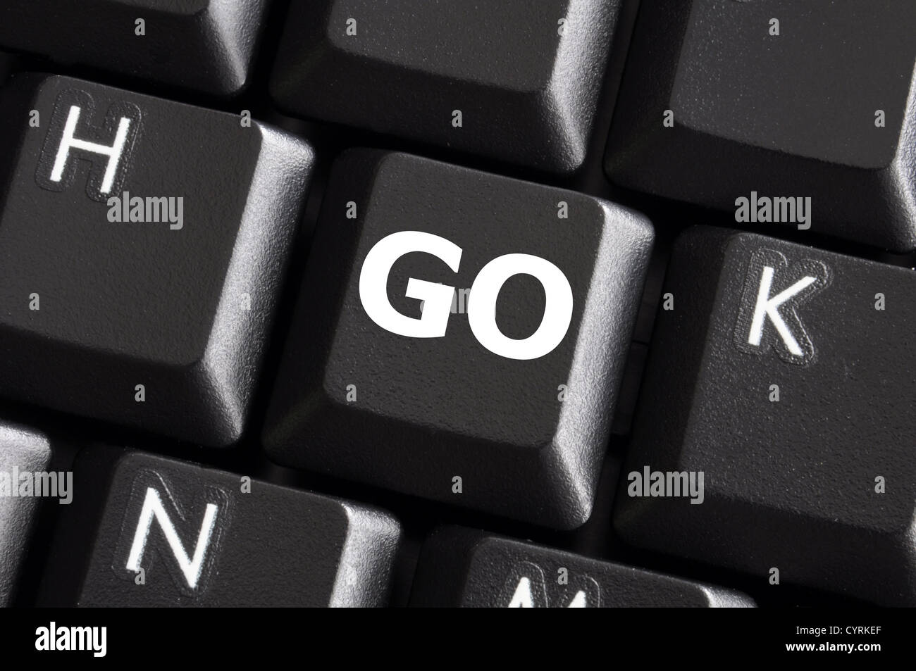 Wort auf einen schwarzen Computer-Tastatur-Taste oder eine Schaltfläche schriftliche gehen Stockfoto