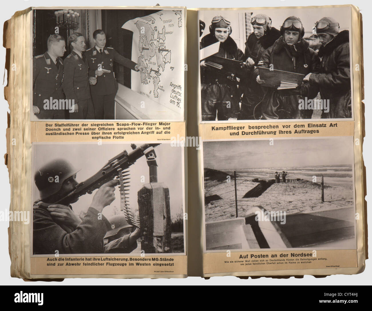 Vier Fotoalben einer Fotoagentur im 3. Reich,großformatige Bilder mit Beschreibungen vier großformatige Fotoalben (30 x 43 cm) mit insgesamt ca. 730 Pressefotos von hervorragender Qualität, meist in 18 x 24 cm Größe, eingeklebt und kommentiert. Sehr beeindruckende Fotos aus der Zeit des Dritten Reiches, mit politischen, militärischen (Kampagnen gegen Polen, Frankreich, etc.), Kunst, Sport und Film-Bilder. Inspektion empfohlen. Eine interessante Gruppierung mit Qualitätsfotos,historisch,Menschen,1930er,1930er,20th century,NS,Nationalsozialismus,Na,Zusatzrechte-Clearences-nicht verfügbar Stockfoto