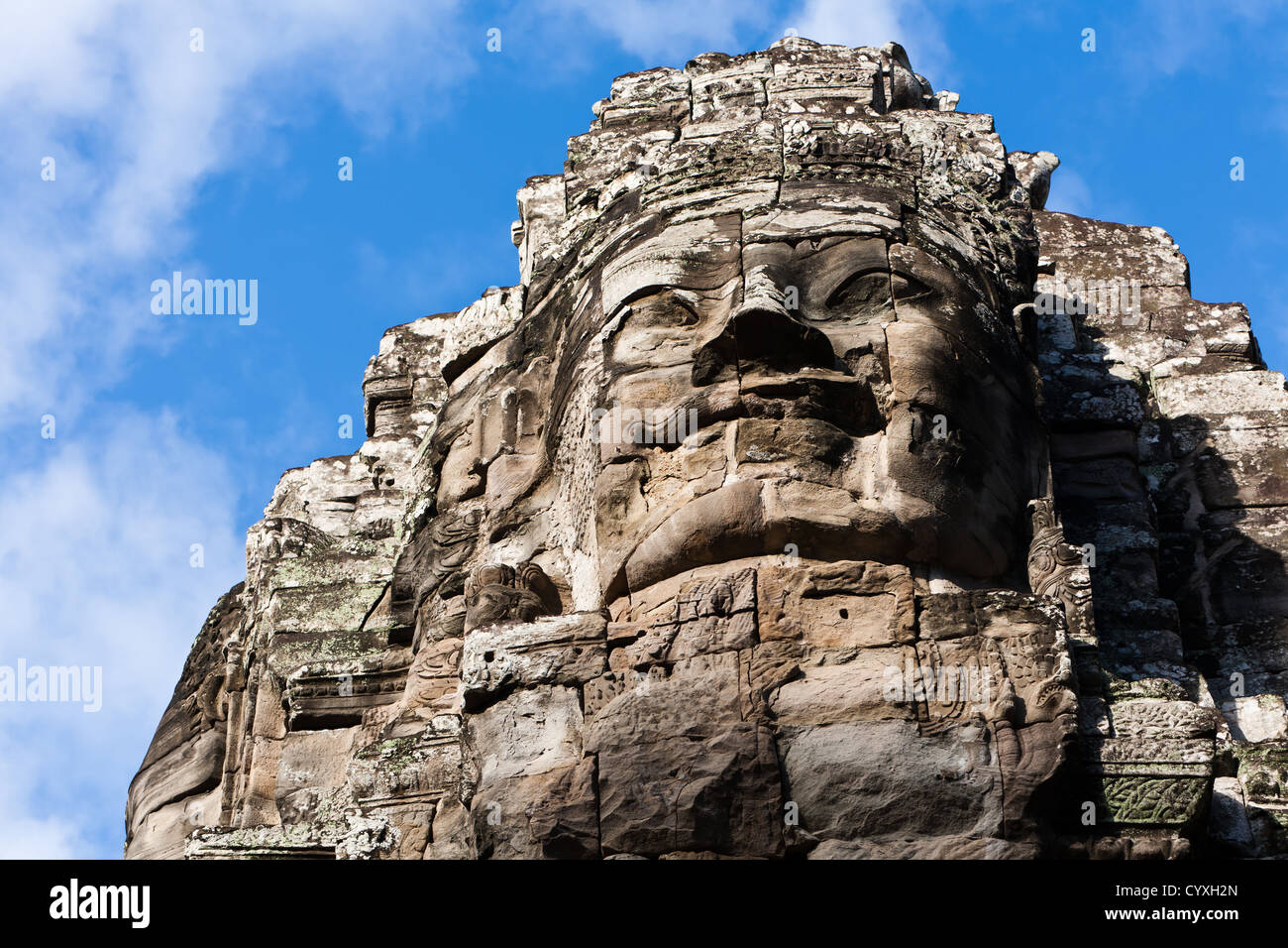 Nahaufnahme des berühmten Kopf Statue des antiken prasat Bayon Tempel in Angkor Wat, Siem Reap, Kambodscha ein Unesco Weltkulturerbe Stockfoto