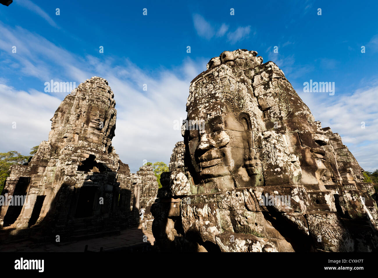 Berühmte Kopf Statuen des Alten prasat Bayon Tempel in Angkor Wat, Siem Reap, Kambodscha ein Unesco Weltkulturerbe Stockfoto