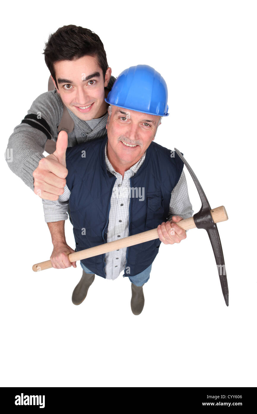 Handwerker geben den Daumen liegt Stockfoto