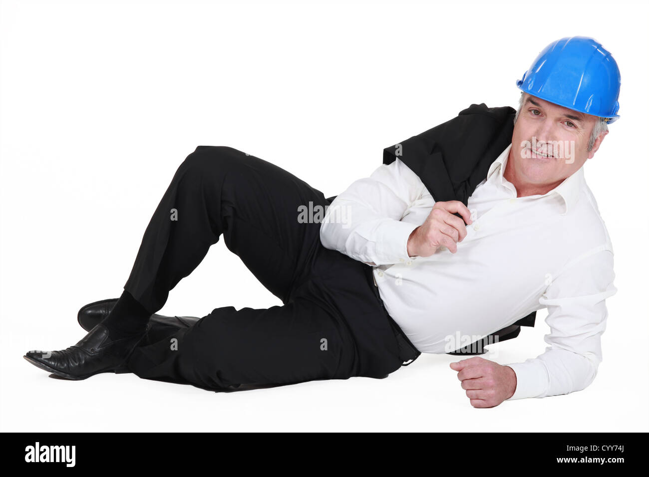 Ingenieur auf dem Boden liegend Stockfoto