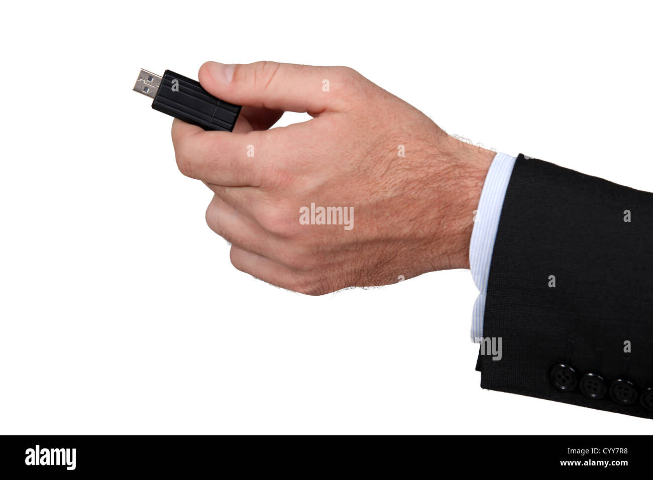 Geschäftsmann hält einen Flash-Treiber Stockfoto