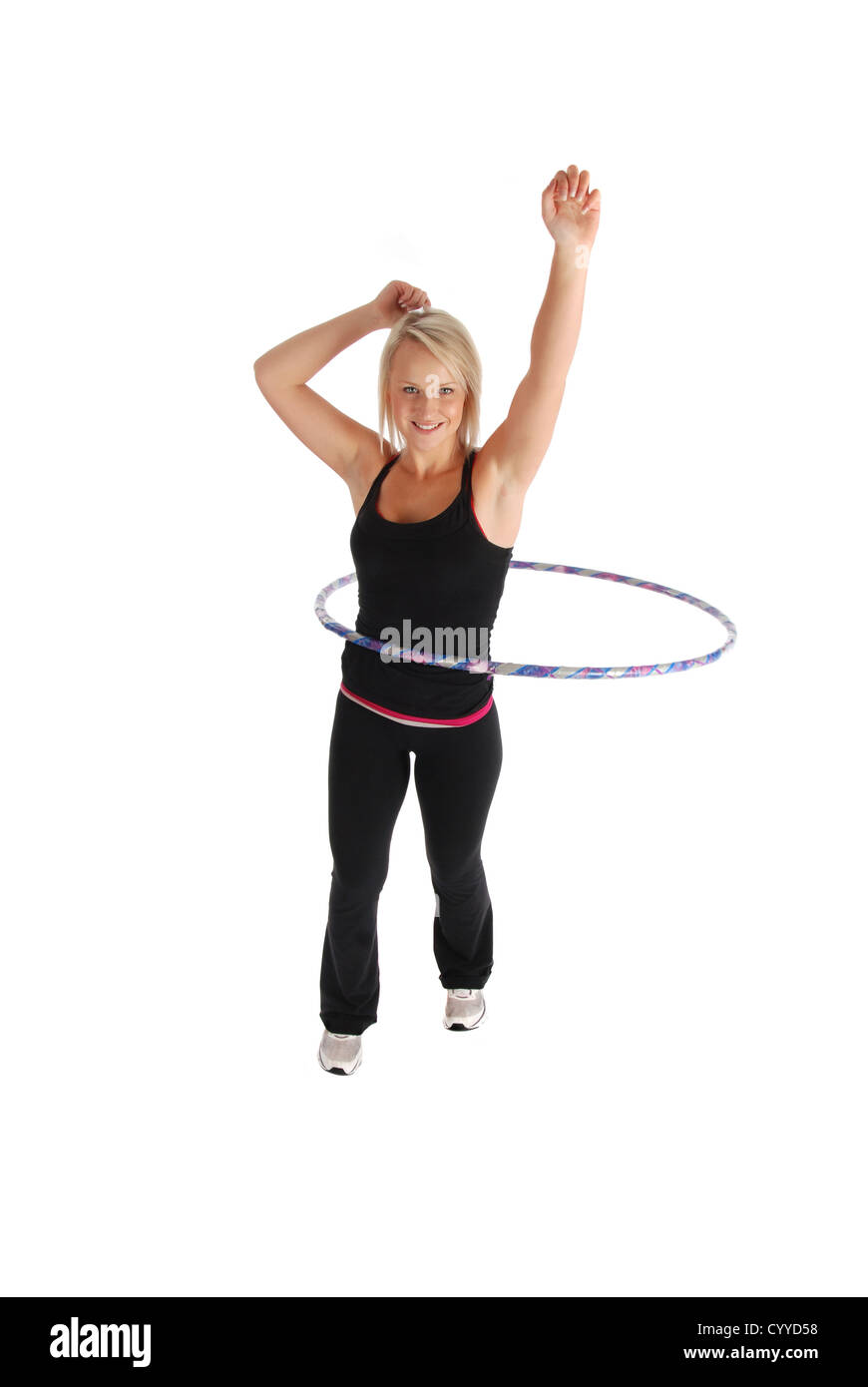 Eine blonde Frau trainieren mit einem Hula Hoop Reifen Stockfoto