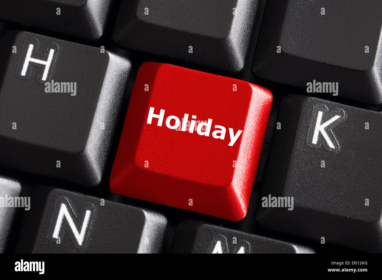 Ferienkonzept mit rote Taste auf der Computertastatur Stockfoto