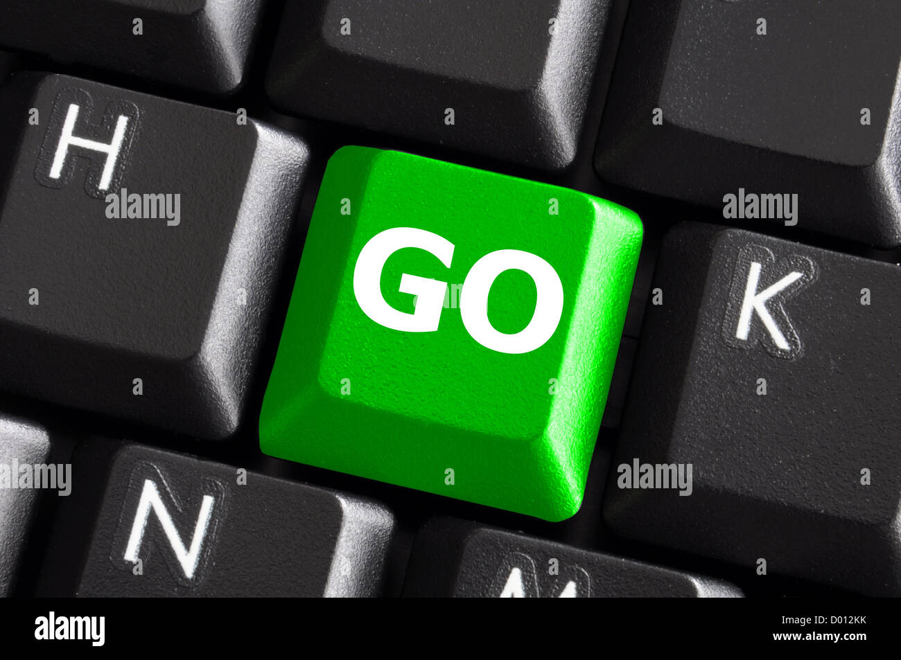 Wort auf einen grünen Computer-Tastatur-Taste oder eine Schaltfläche schriftliche gehen Stockfoto