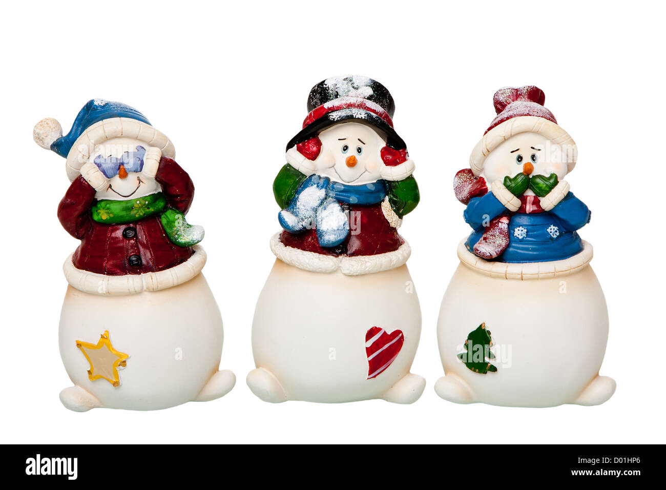 Glücklich lächelnd weiße Weihnachten Schneemänner mit Schals und Mützen, sehen, hören und sprechen nichts Böses, für Augen, Ohren und Mund, isoliert Stockfoto