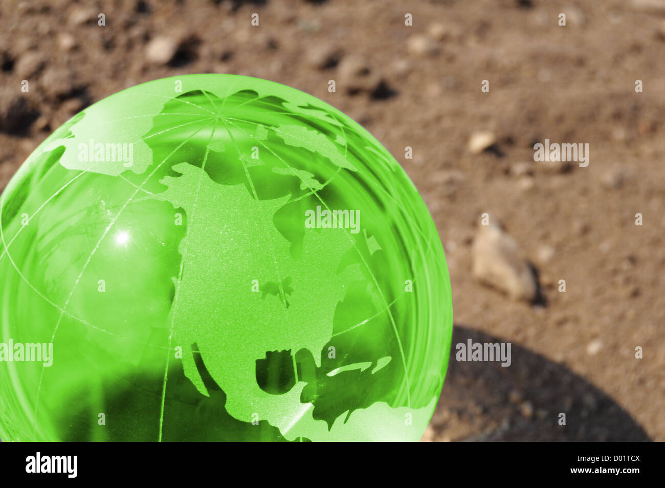 Änderung Klimakonzept mit Erde auf trockenem Boden und Exemplar Stockfoto