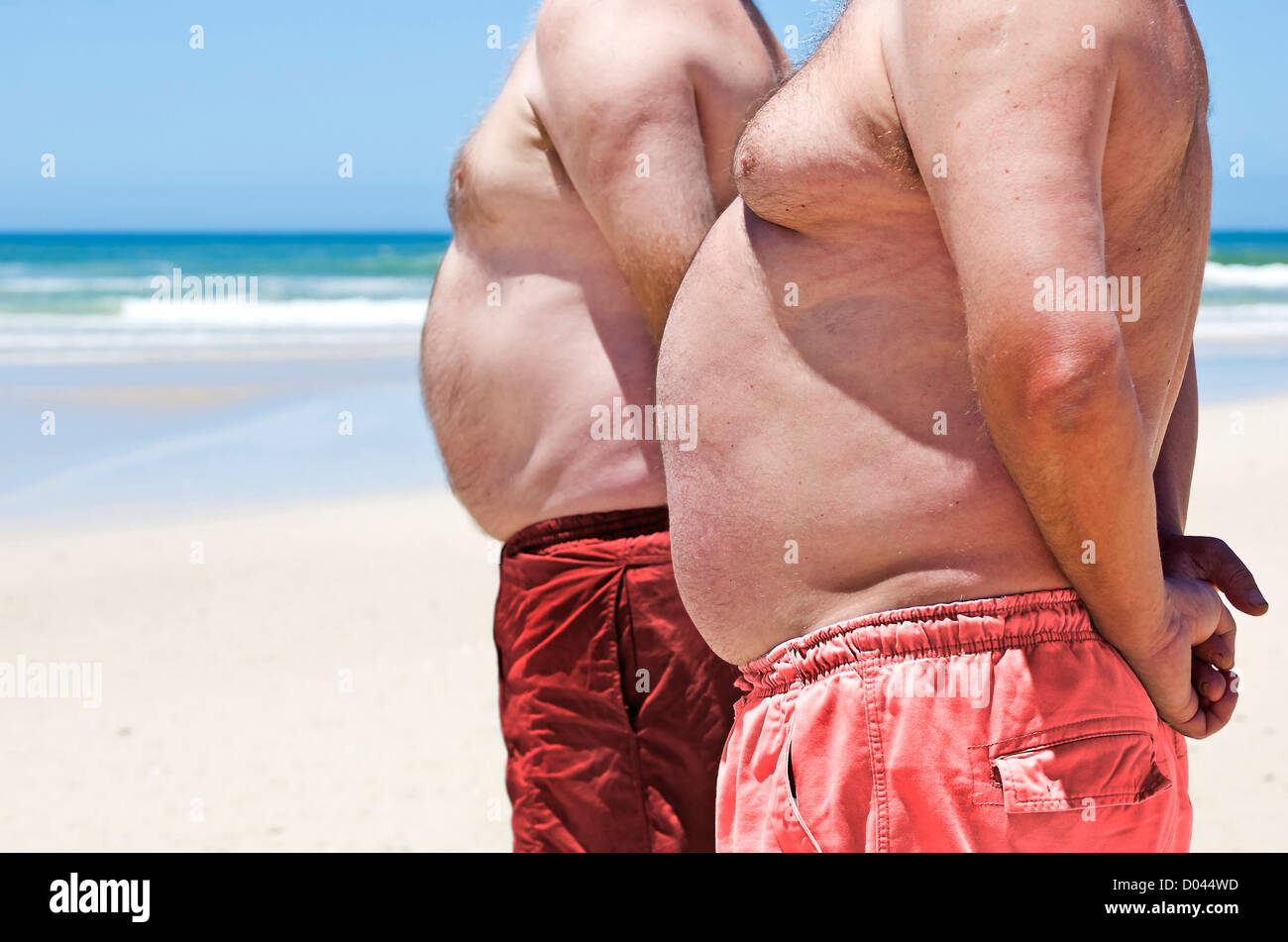 Overweight man beer belly beach -Fotos und -Bildmaterial in hoher Auflösung  – Alamy