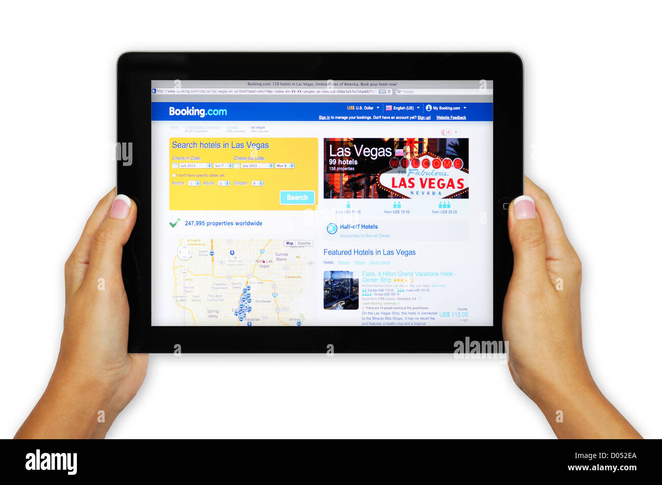 iPad-Bildschirm zeigt Booking.com Webseite - Online-Reise-arrangements Stockfoto