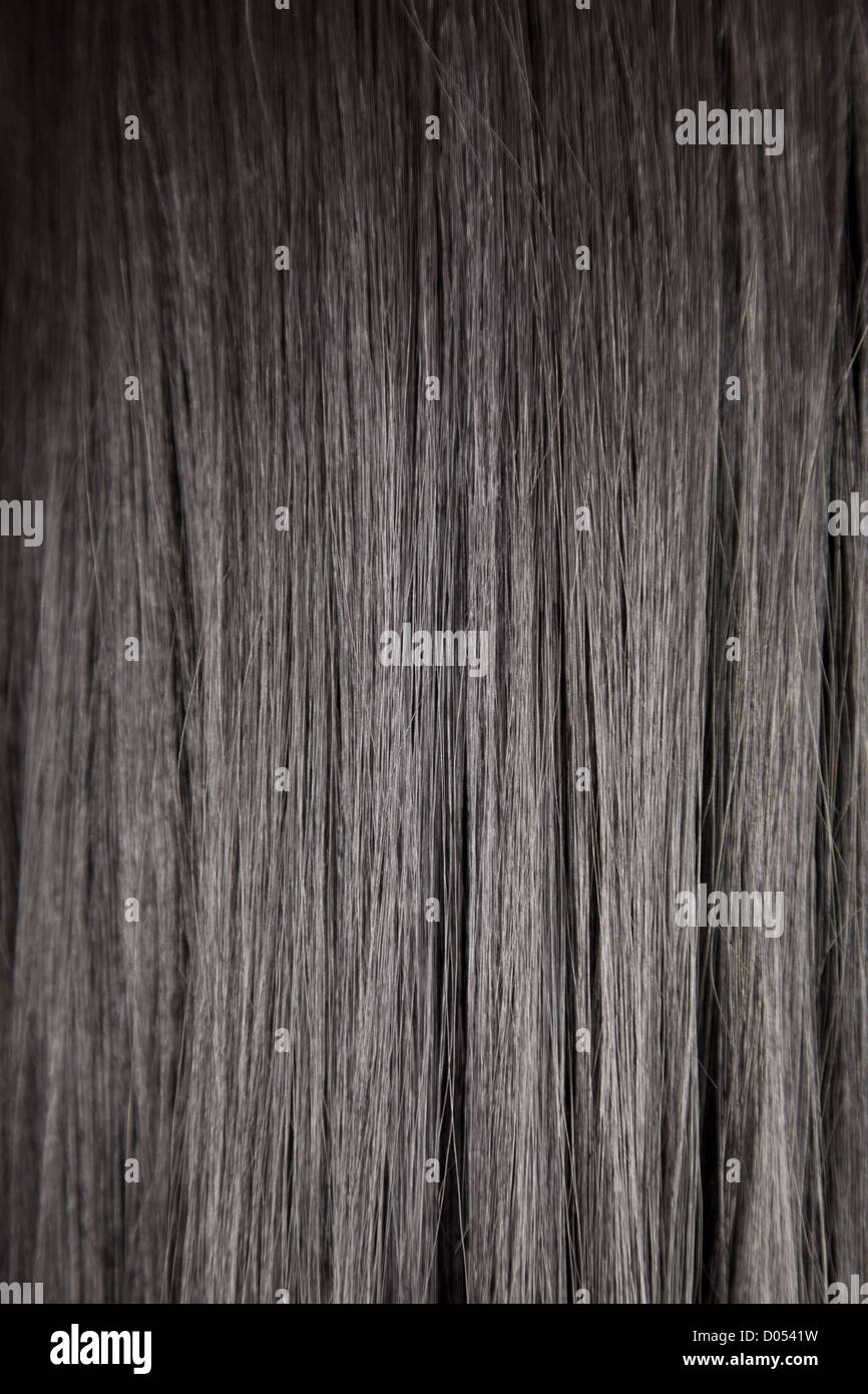 Textur von schwarz glänzend glattes Haar, soft-Fokus Stockfoto