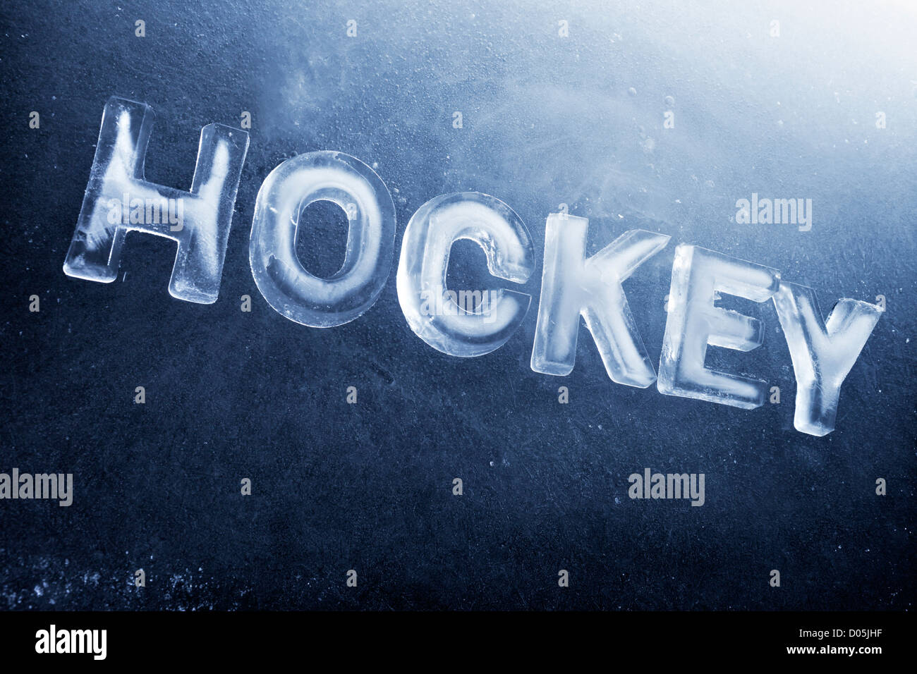 Das Wort Hockey mit echtem Eis Briefe geschrieben. Stockfoto
