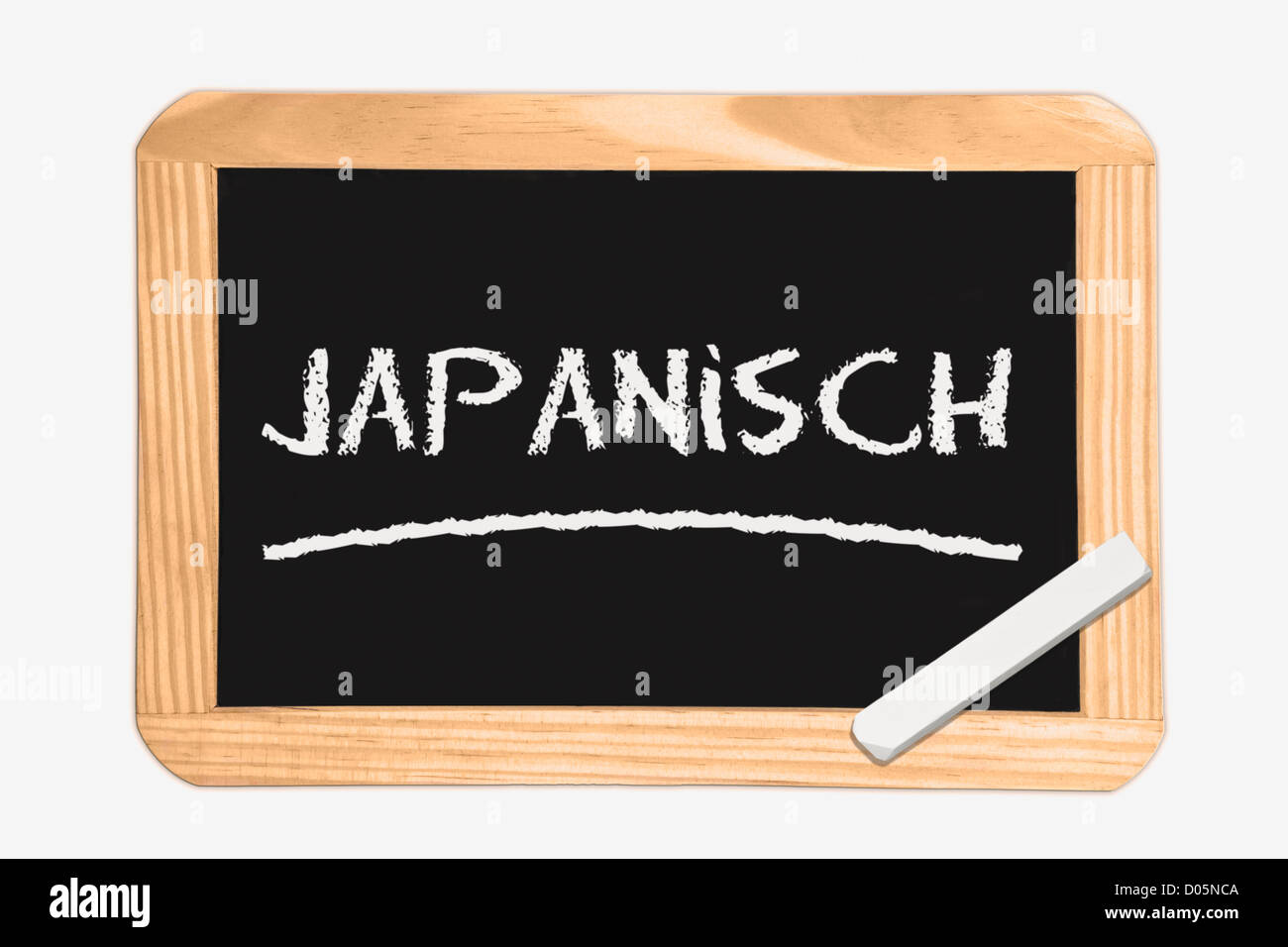 Detail-Foto von einer Tafel mit deutscher Inschrift Japaner, weiße Kreide liegt in einer Ecke Stockfoto