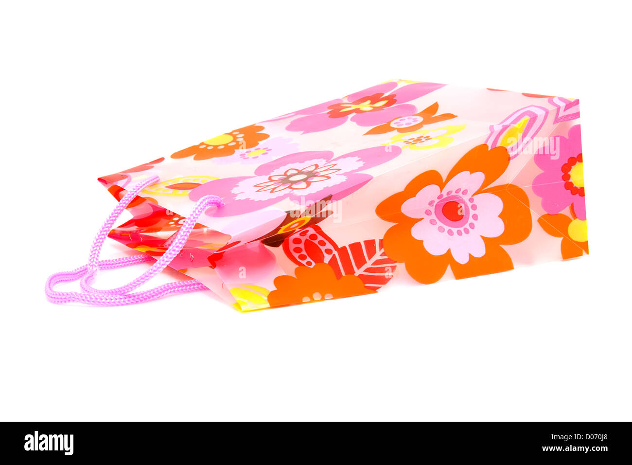 Plastiktüte mit Blumenmotiv auf weißem Hintergrund Stockfoto
