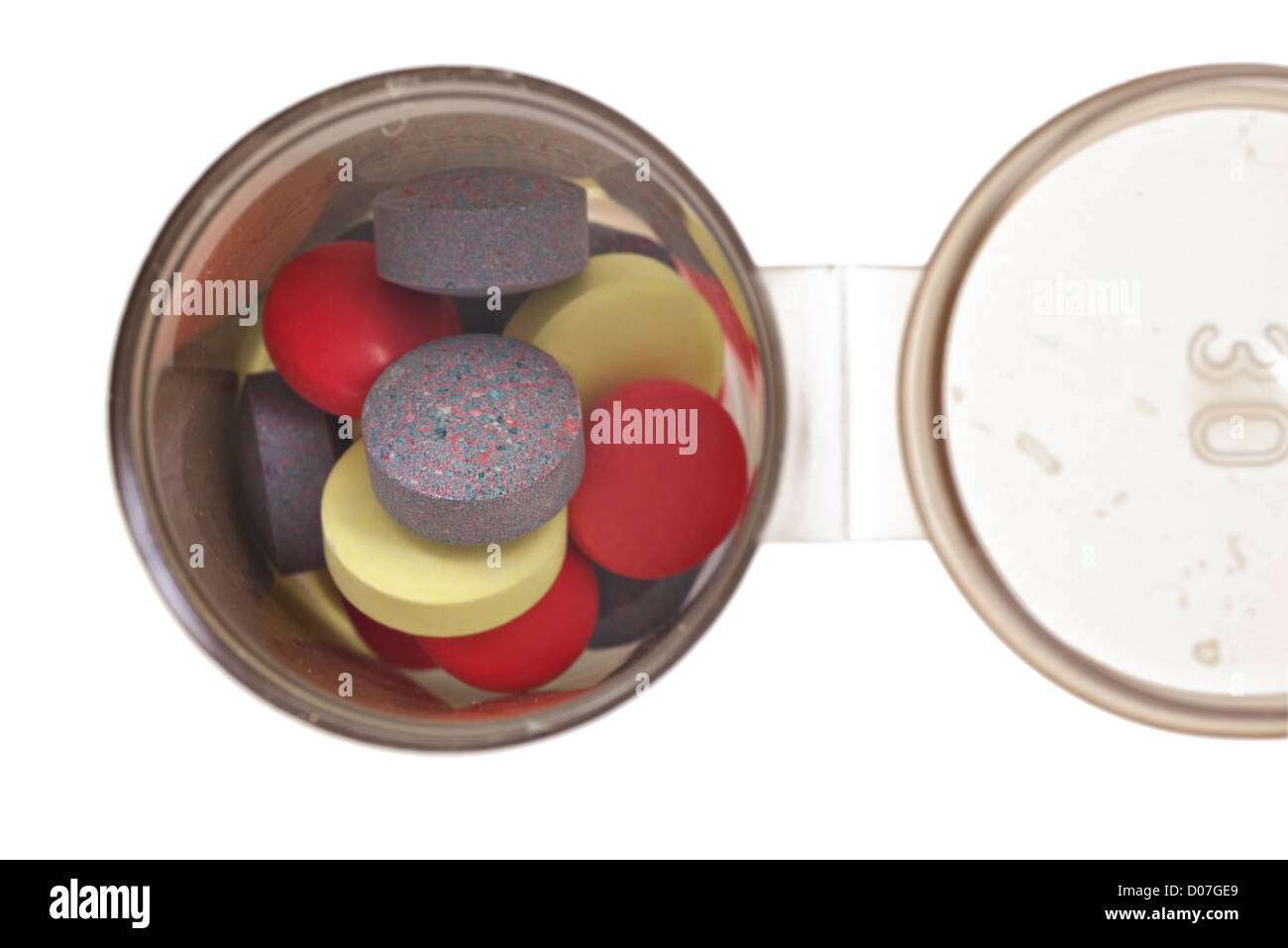 Pille-Flasche mit Pillen auf weiß - sehr geringe Schärfentiefe Stockfoto