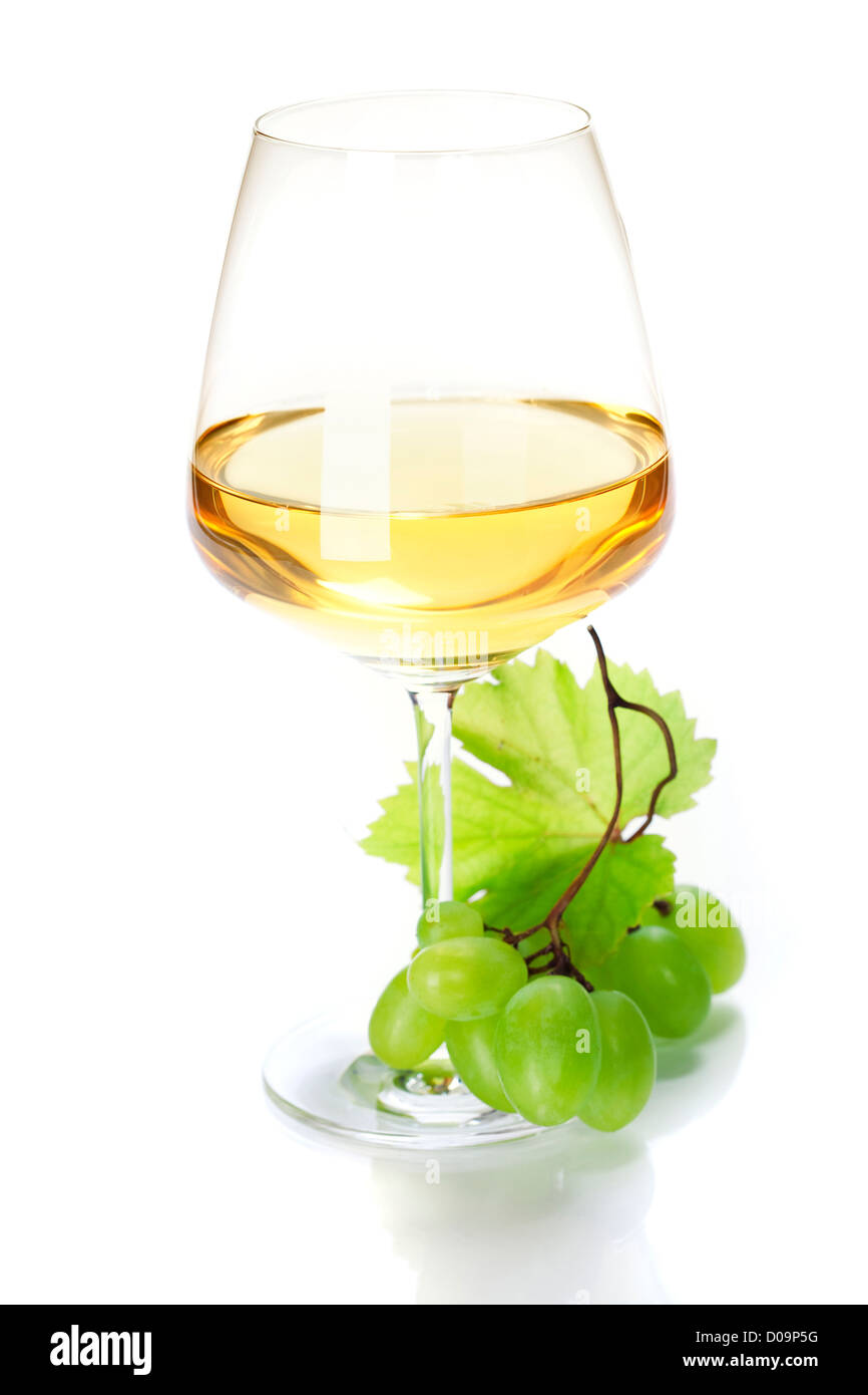 Weinglas mit weissen Wein und Traubenmost Stockfoto