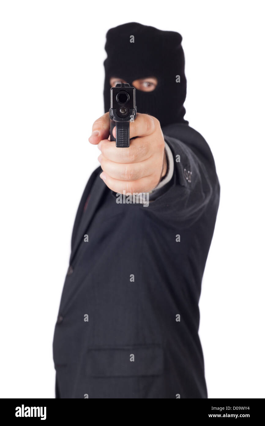 terroristischen Business-Mann, mit einem Gewehr auf Sie verweisen. Stockfoto