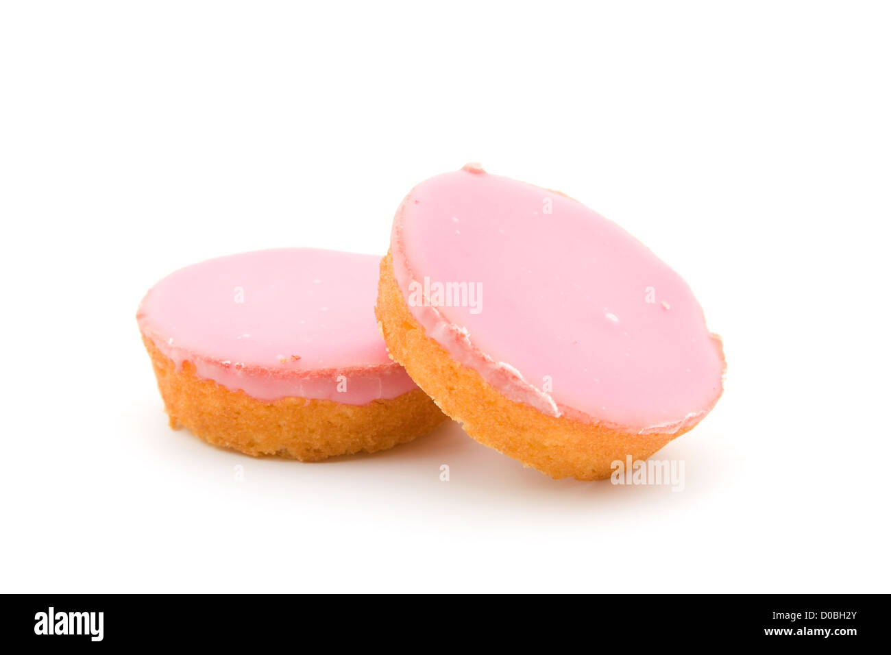 Rosa glasierte Cookies, isoliert auf weißem Hintergrund Stockfoto
