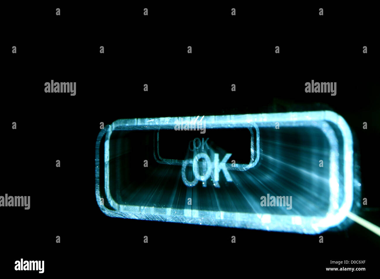 abstrakte ok-Taste in Dunkelheit Stockfoto