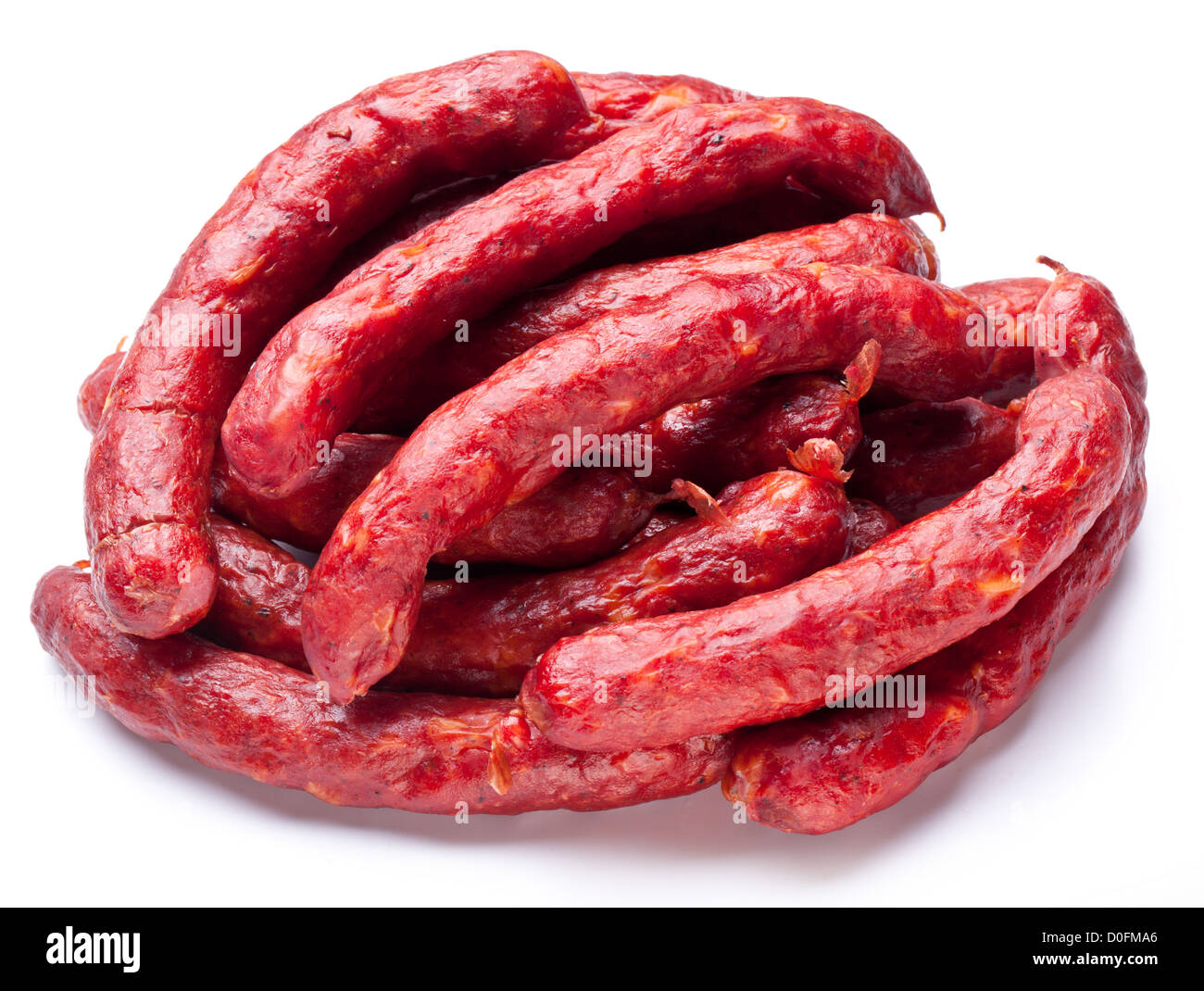 Geräucherte Würstchen auf weißem Hintergrund Stockfoto