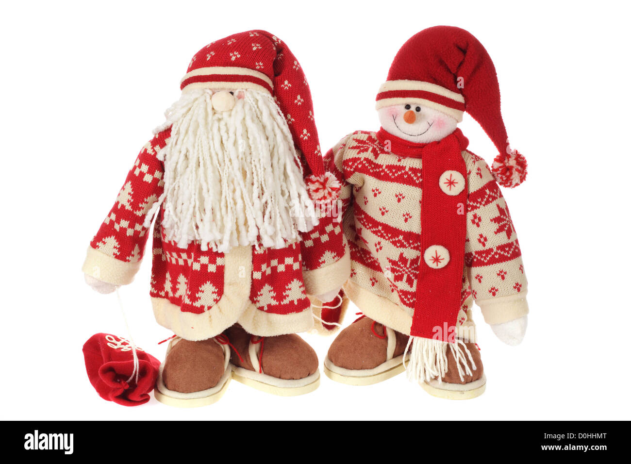 Santa Claus und lächelnd Schneemann-Puppe Stockfoto