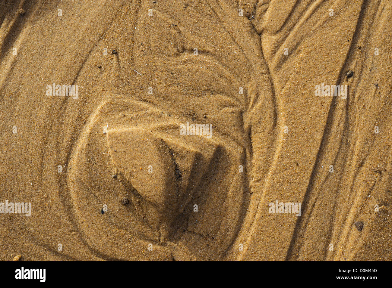 Muster im Sand von zurückweichenden Flut verursacht, Stockfoto