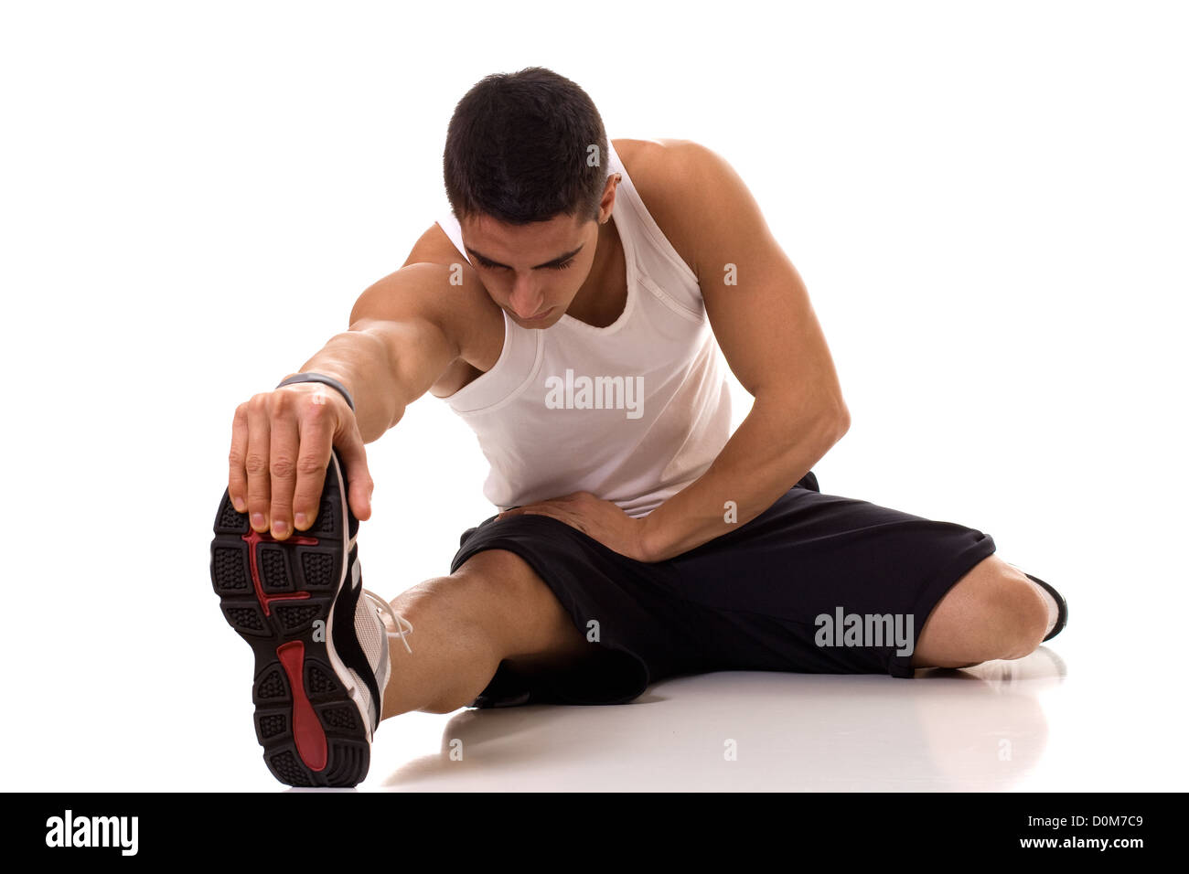 Sitzen Muskelfaserriss Stretch Stockfoto