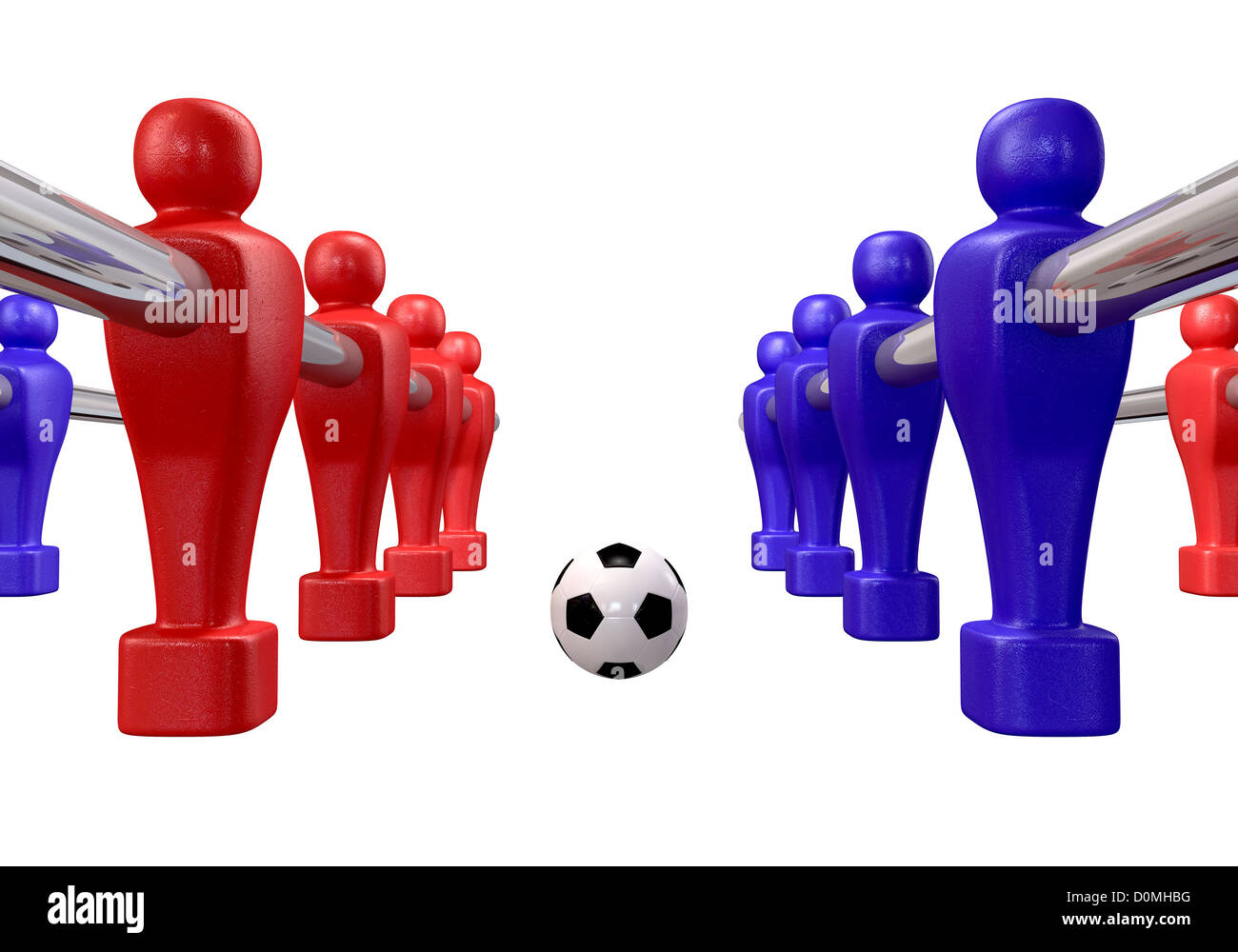 Tischfußball-Spieler von einem blauen und roten Team im Wettbewerb um einen Fußball auf einem isolierten Hintergrund Stockfoto