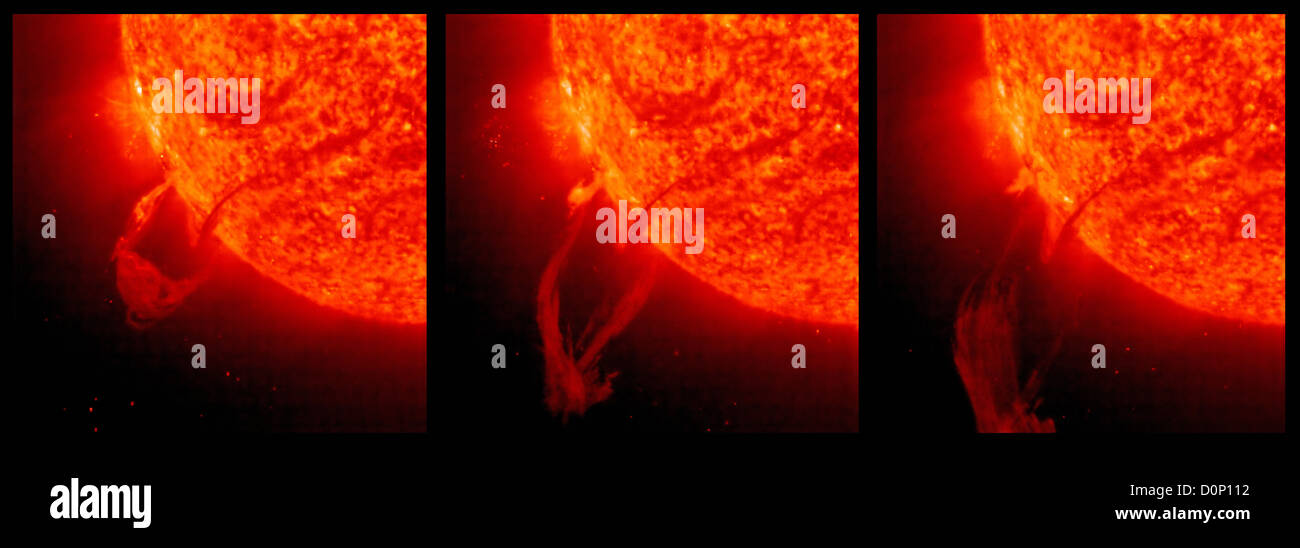 Die Solar Heliospheric Observatory (SOHO) beobachtet zwei riesige eruptive Protuberanzen wölbte sich Sonne.  Sie waren gefangen in Stockfoto