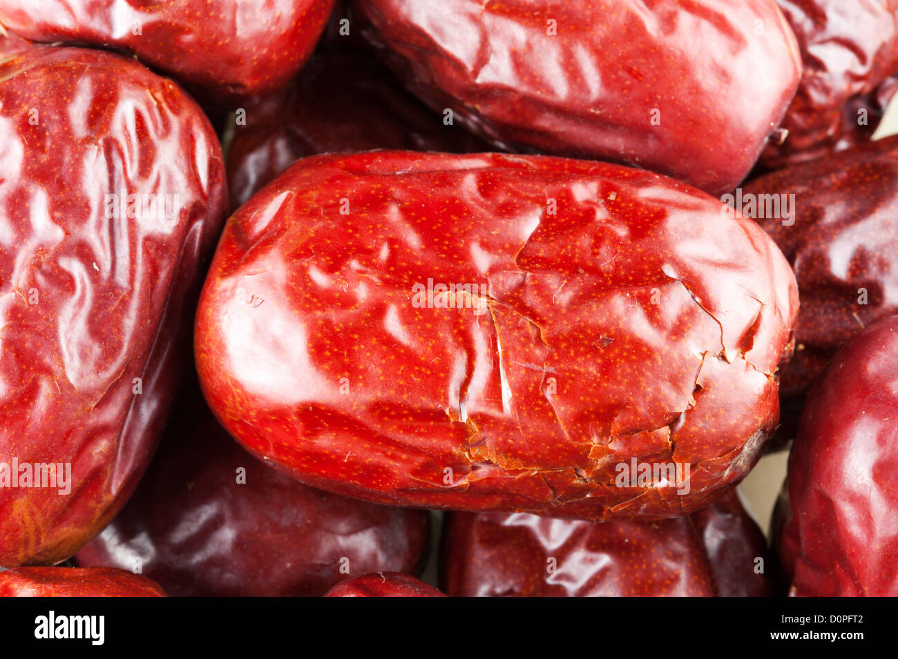 Ein Haufen von Rote Datteln Closeup-Detailansicht Stockfoto