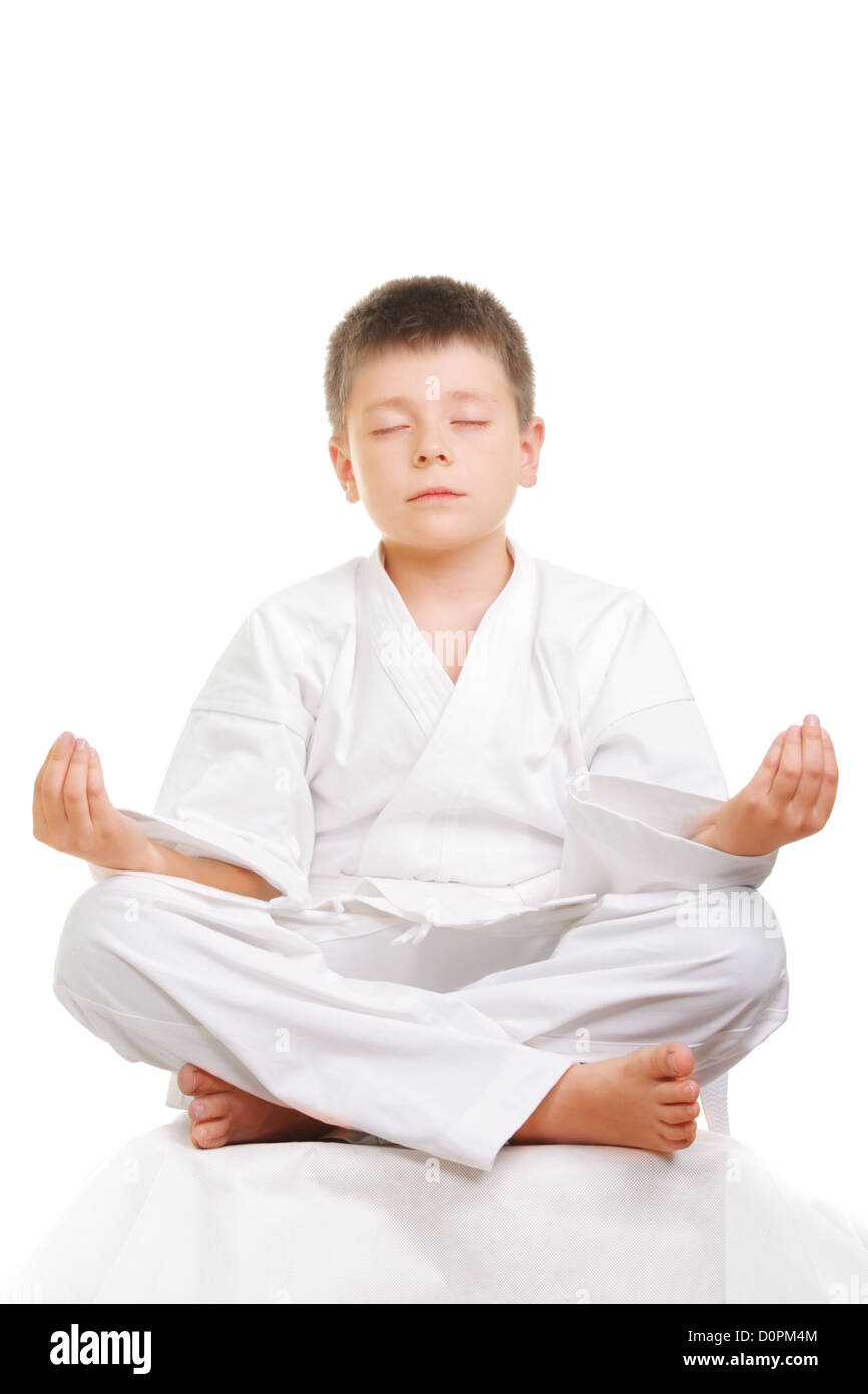 Meditieren Karate boy Stockfoto