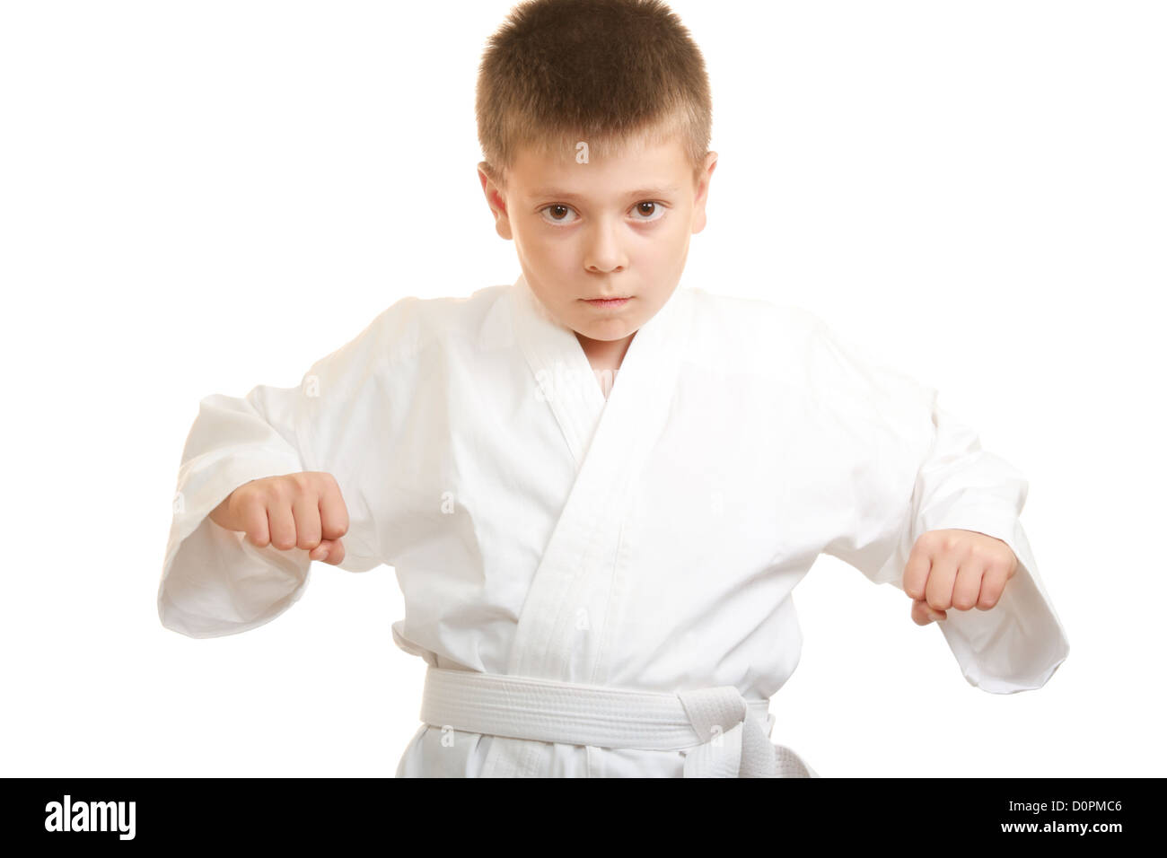 Karate-junge Lockerungsübungen Stockfoto