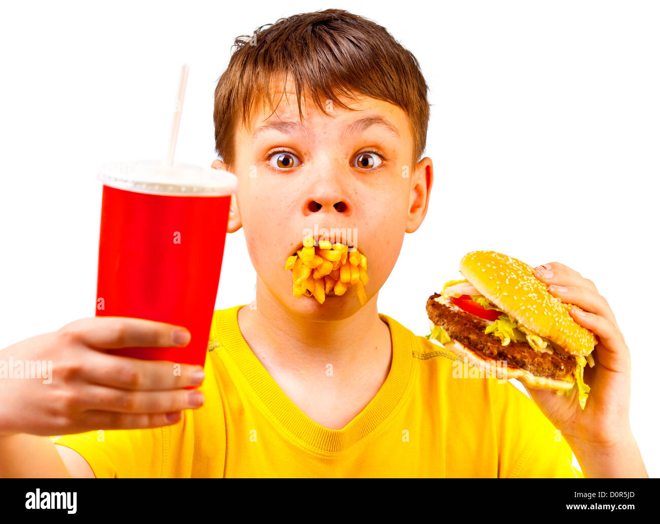 Kind und Fast food Stockfoto