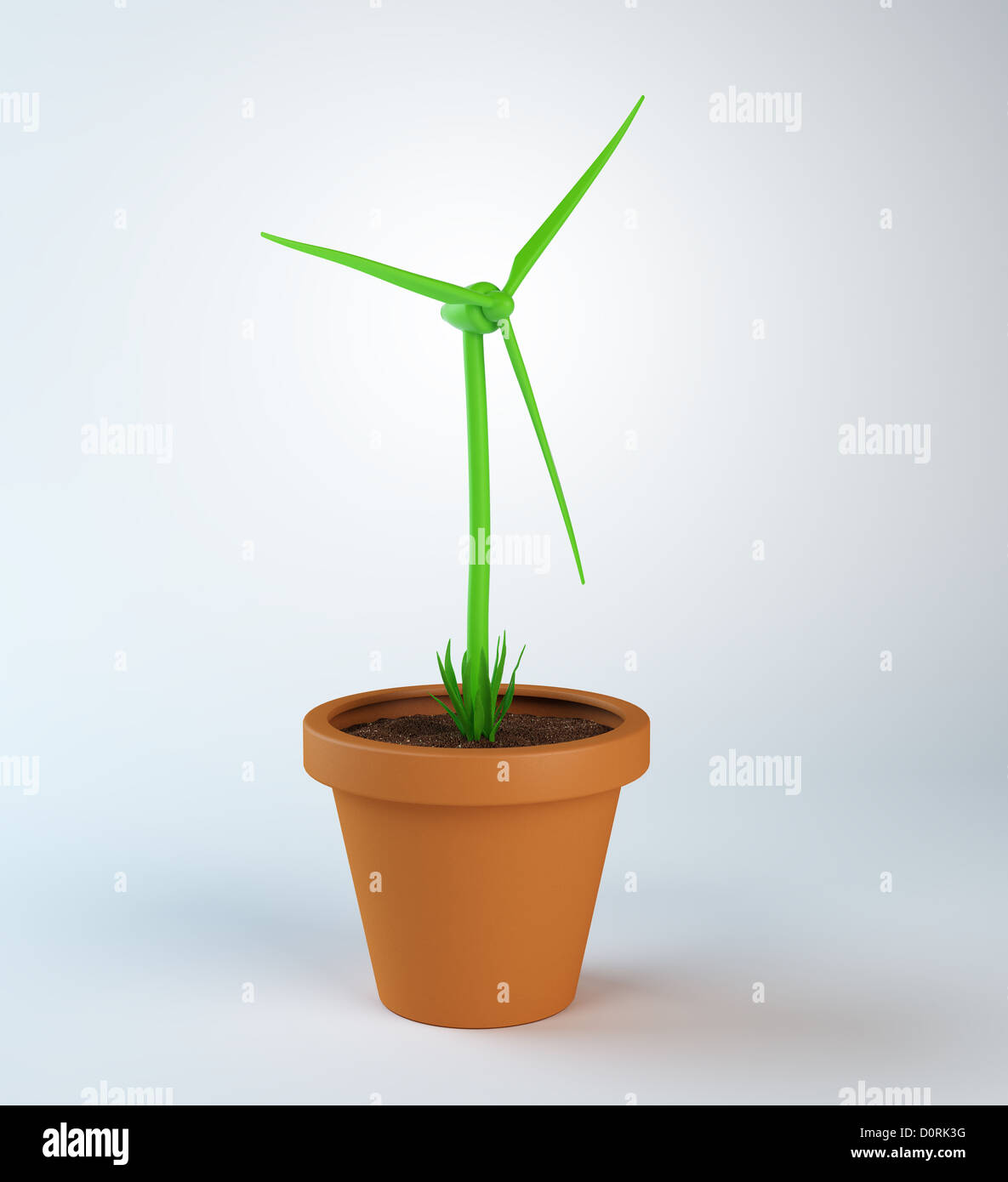 Windturbine wächst aus einer Topfpflanze Stockfoto