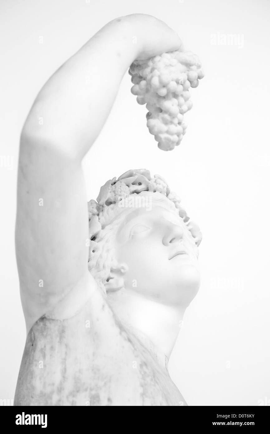 Statue mit Trauben Stockfoto